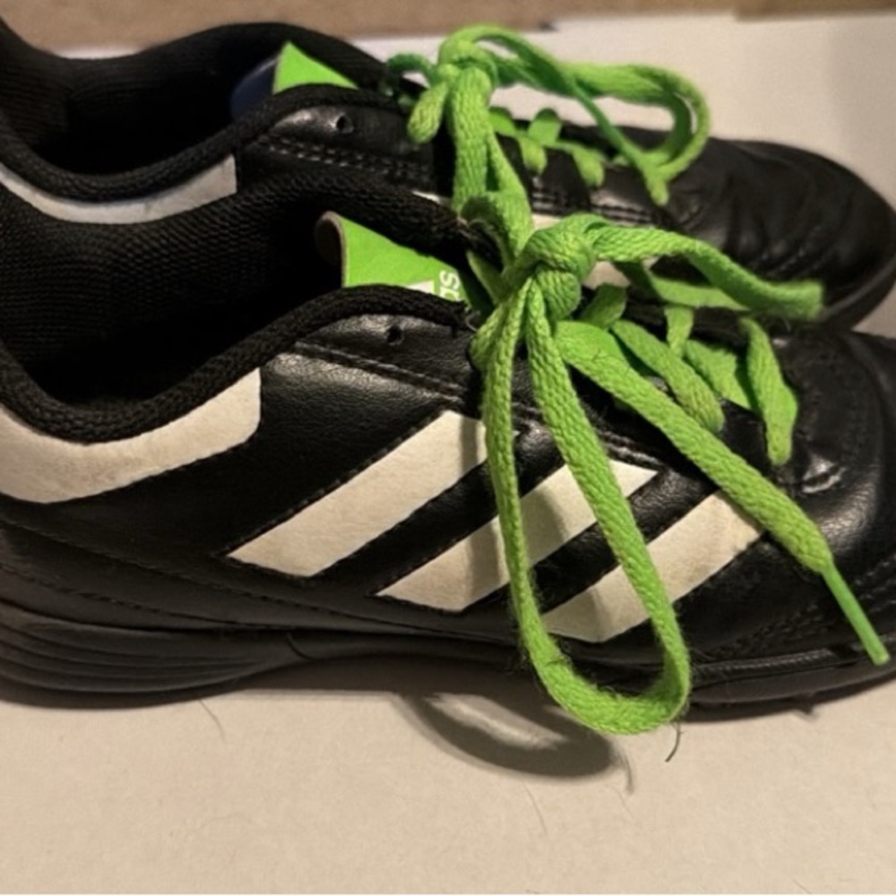 Kids Black and Green soccer cleats